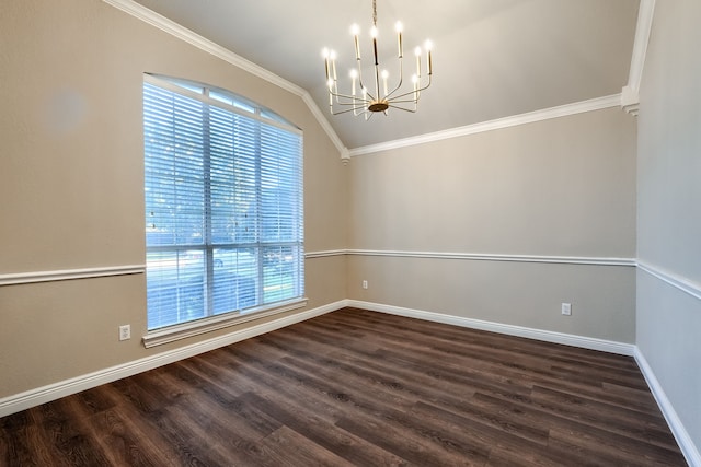 spare room featuring dark hardwood / wood-style flooring and ornamental molding