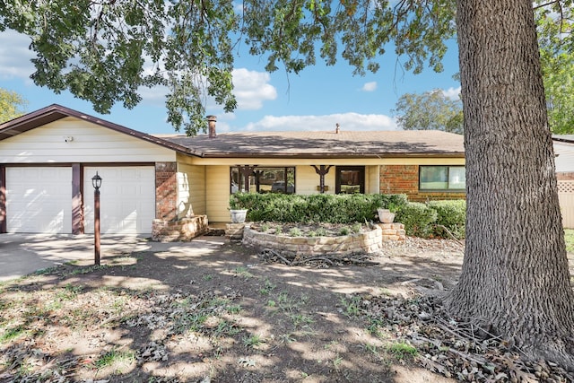 single story home with a garage