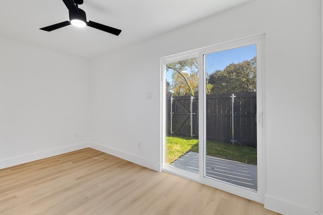 interior space with ceiling fan and light hardwood / wood-style flooring