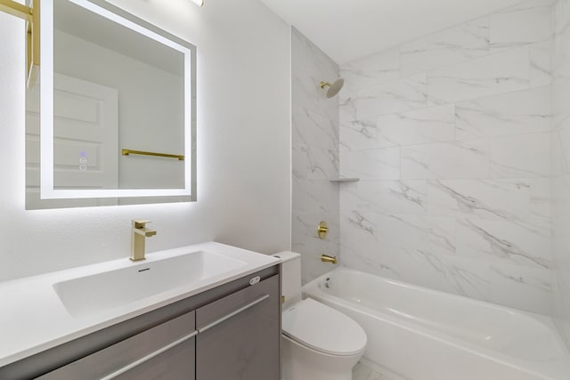 full bathroom with tiled shower / bath combo, toilet, and vanity