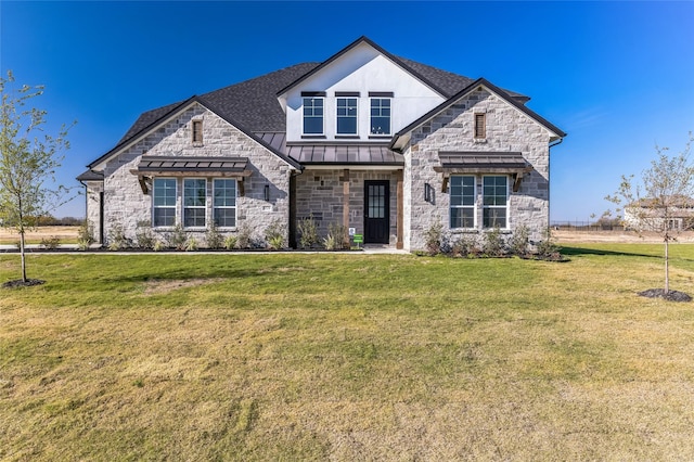 view of front facade featuring a front yard