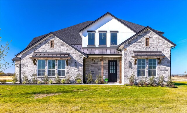 view of front of house with a front yard