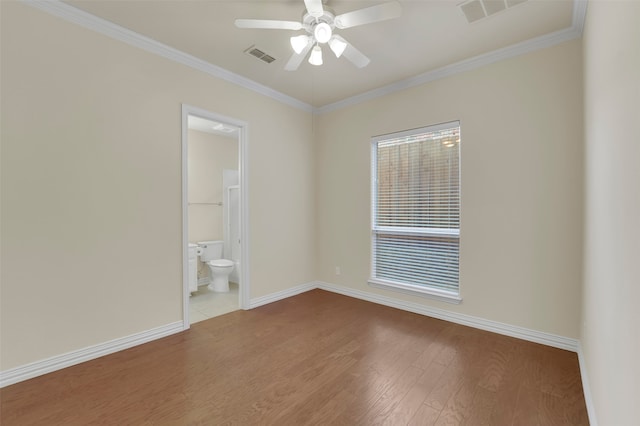 unfurnished room featuring ceiling fan, light hardwood / wood-style flooring, and ornamental molding