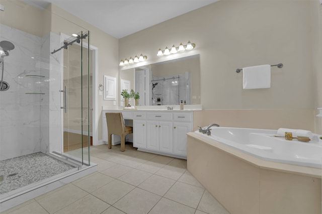 bathroom featuring plus walk in shower, tile patterned flooring, and vanity