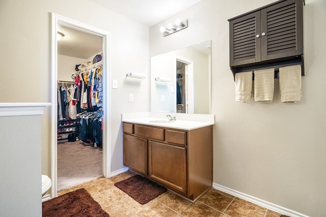 bathroom featuring tile patterned floors and vanity