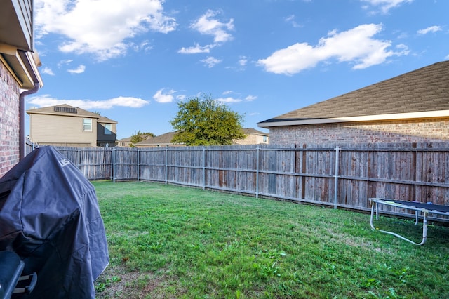 view of yard featuring a trampoline