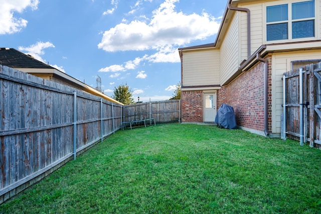 view of yard featuring a trampoline