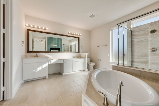 2438 Meridian Pl, Midlothian, TX 76065 - bathroom with double vanity, a garden tub, a shower stall, and toilet