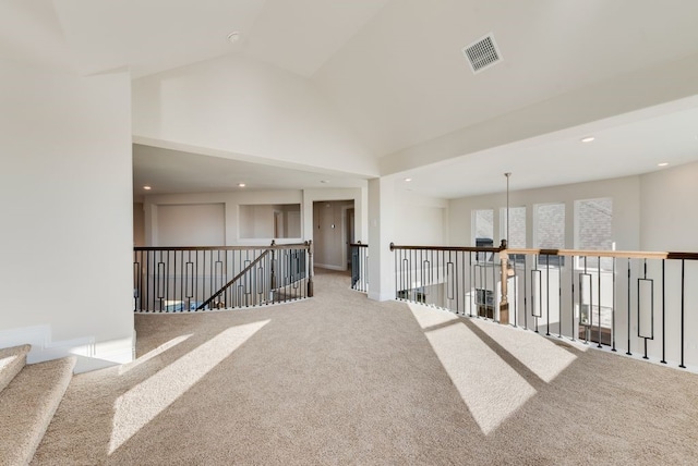 2438 Meridian Pl, Midlothian, TX 76065 - corridor featuring carpet floors, an upstairs landing, recessed lighting, high vaulted ceiling, and baseboards