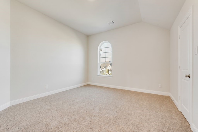 2438 Meridian Pl, Midlothian, TX 76065 - unfurnished room with lofted ceiling, light carpet, and baseboards
