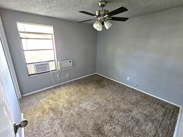 carpeted spare room featuring ceiling fan, cooling unit, and a textured ceiling