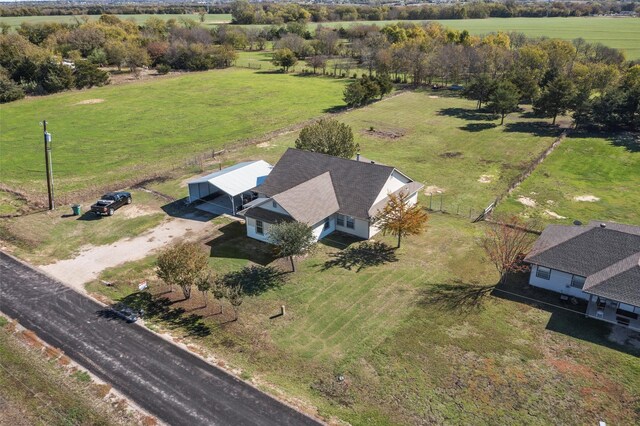 birds eye view of property featuring a rural view