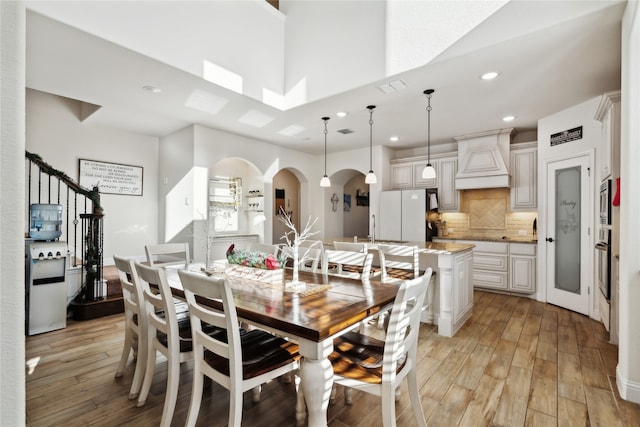 dining area featuring light hardwood / wood-style flooring and sink