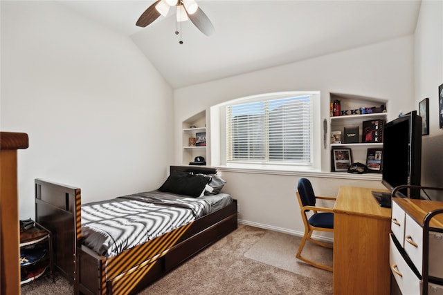 bedroom featuring ceiling fan, light colored carpet, and vaulted ceiling