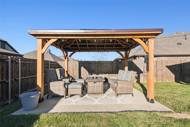 view of patio / terrace featuring a gazebo and an outdoor fire pit