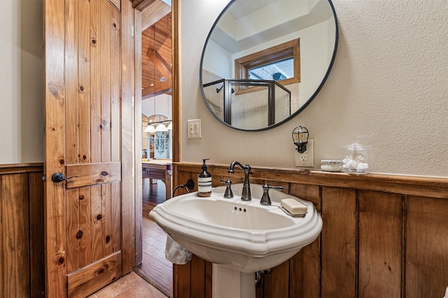 bathroom with tile patterned floors