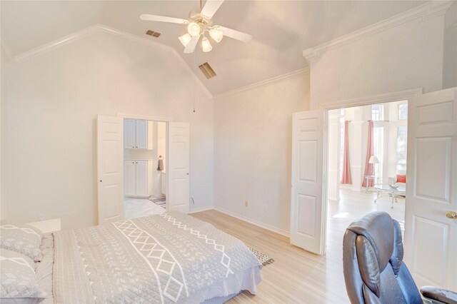 bedroom with ceiling fan, high vaulted ceiling, ornamental molding, and light wood-type flooring