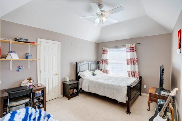 bedroom with ceiling fan, light colored carpet, and lofted ceiling