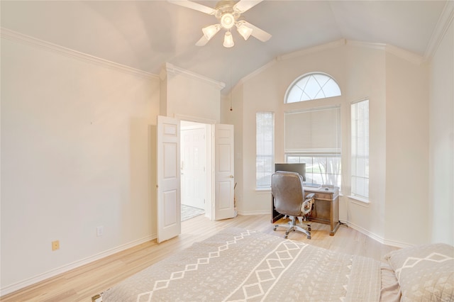 home office featuring ceiling fan, light hardwood / wood-style floors, lofted ceiling, and ornamental molding