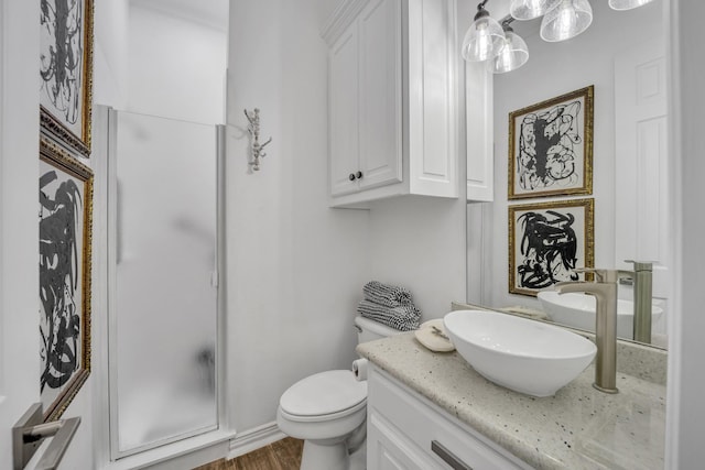 2405 Deer Run Ct, Heath, TX 75032 - bathroom featuring vanity, a walk in shower, and wood finished floors