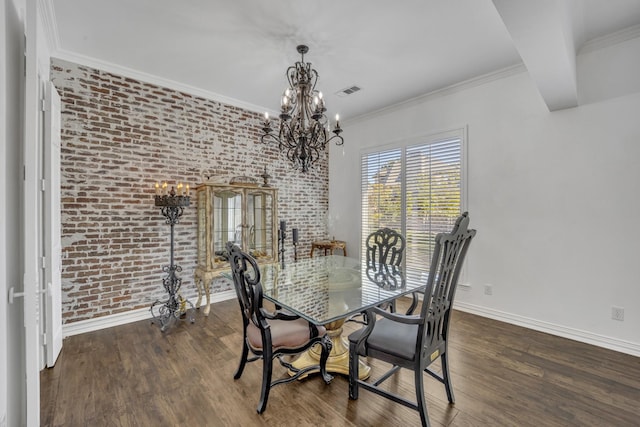 2405 Deer Run Ct, Heath, TX 75032 - dining room with a chandelier, wood finished floors, brick wall, and crown molding
