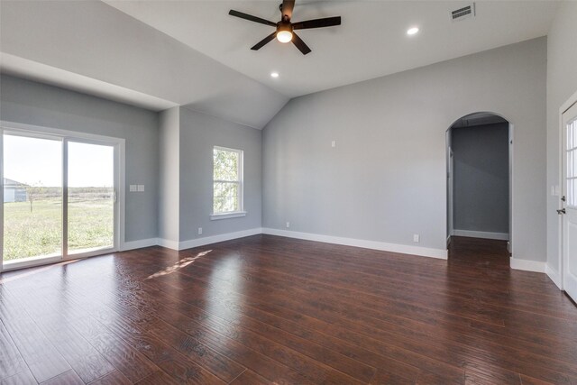 unfurnished room featuring ceiling fan, dark hardwood / wood-style flooring, and lofted ceiling