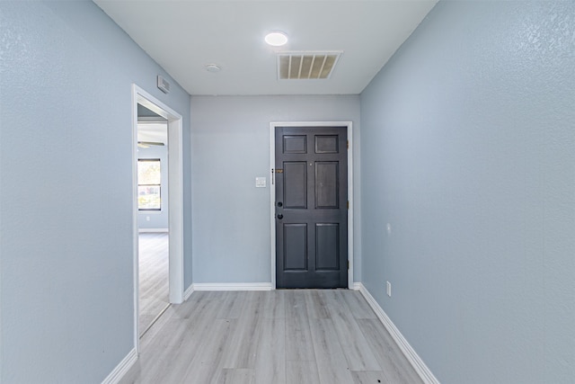 doorway featuring light hardwood / wood-style floors