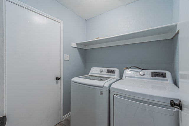 washroom with washer and dryer