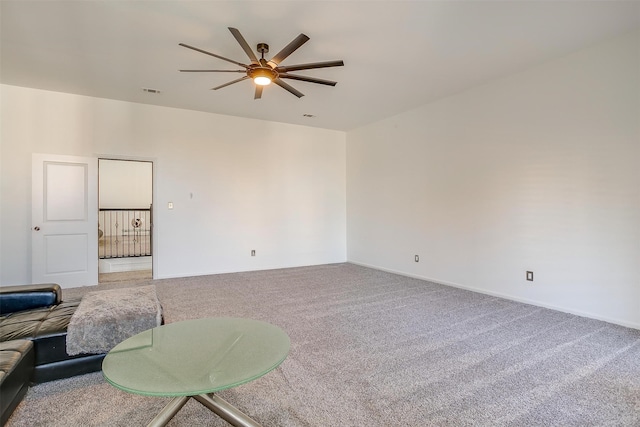 living room featuring a wealth of natural light, french doors, carpet, and ceiling fan