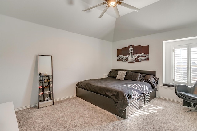 carpeted bedroom featuring ceiling fan and lofted ceiling