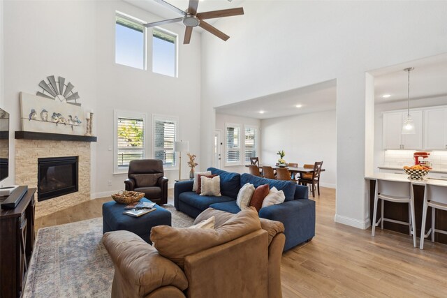 bedroom featuring visible vents, ceiling fan, a towering ceiling, and carpet flooring