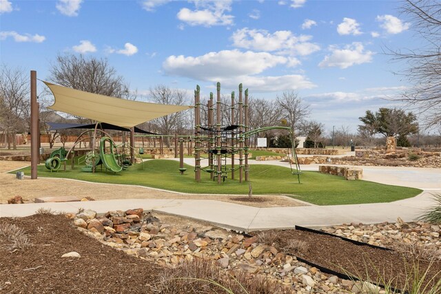 rear view of house with a yard, a patio area, a fenced backyard, and a fenced in pool