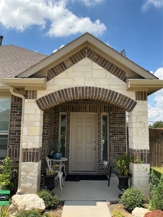 entrance to property with covered porch