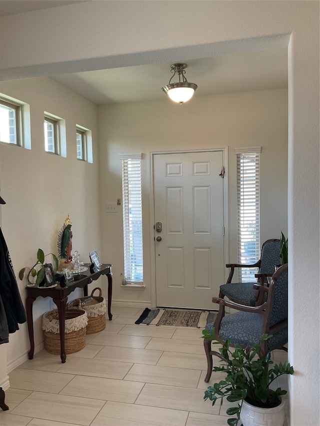 entryway with a healthy amount of sunlight and light wood-type flooring