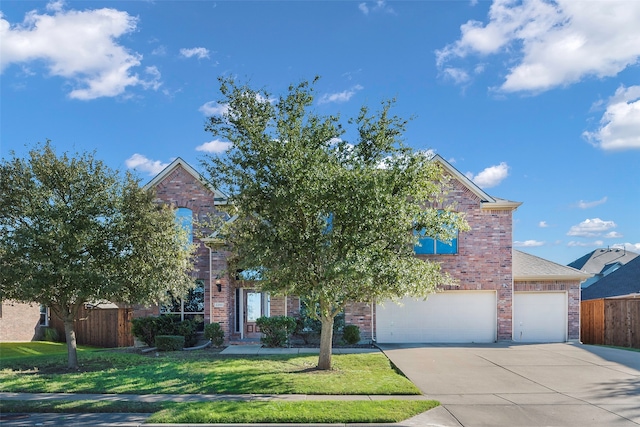 view of front facade featuring a garage and a front yard