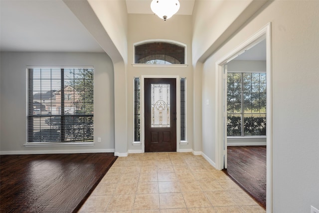 entryway featuring light hardwood / wood-style flooring and a healthy amount of sunlight