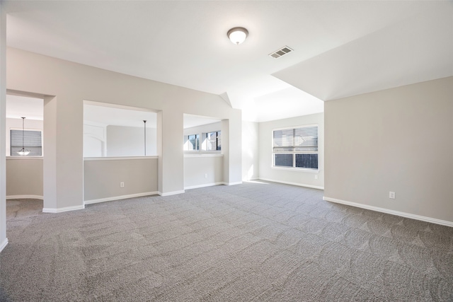 unfurnished living room with carpet