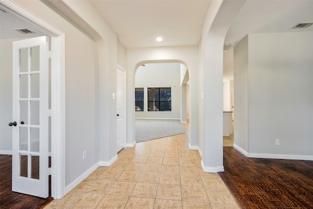 hall featuring light hardwood / wood-style flooring