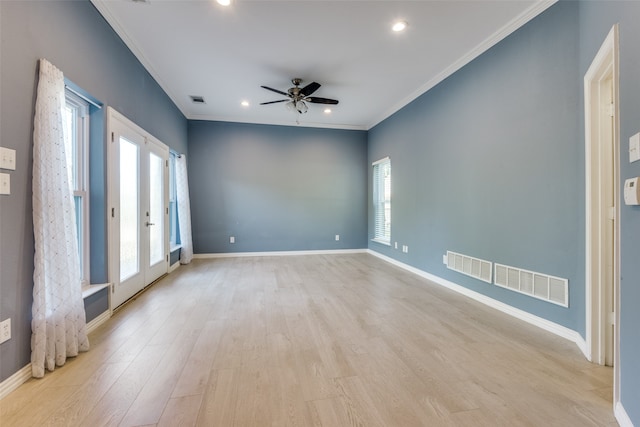 unfurnished room with ceiling fan, french doors, crown molding, and light hardwood / wood-style flooring