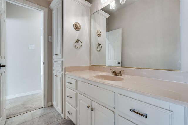 bathroom with tile patterned flooring and vanity