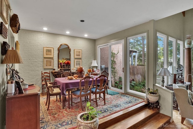 dining area with wood-type flooring