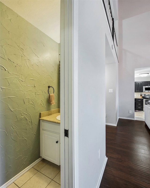 bathroom with wood-type flooring