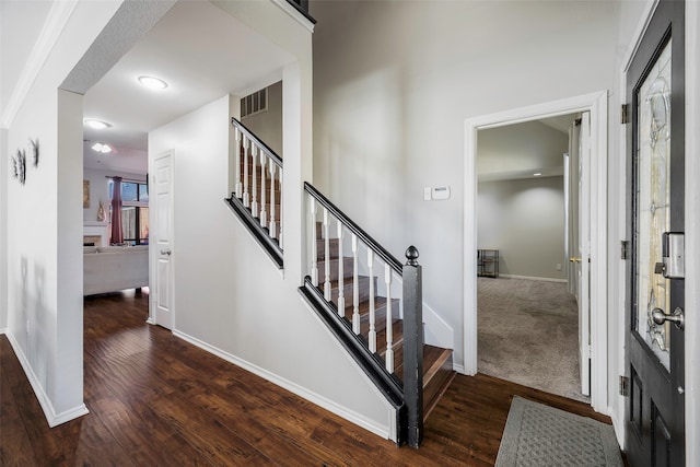 entryway featuring dark wood-type flooring