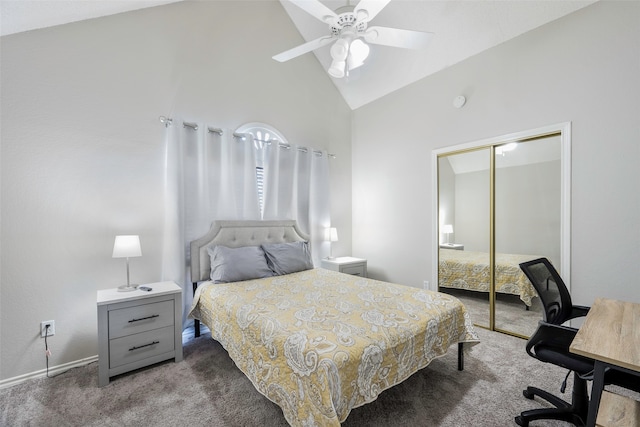 carpeted bedroom with ceiling fan, high vaulted ceiling, and a closet