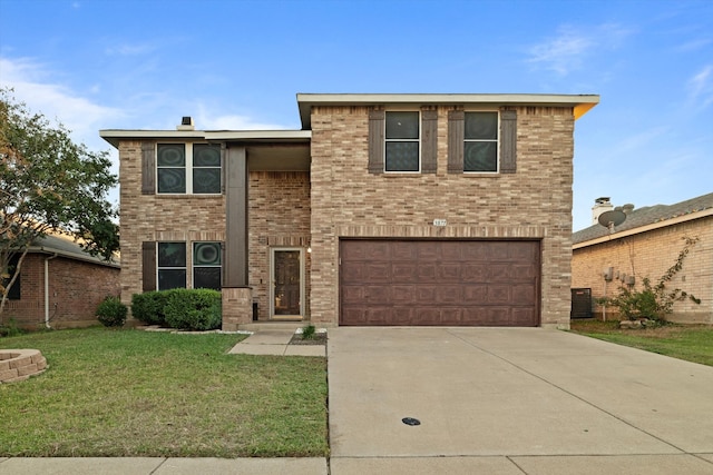 front facade with a front lawn and a garage