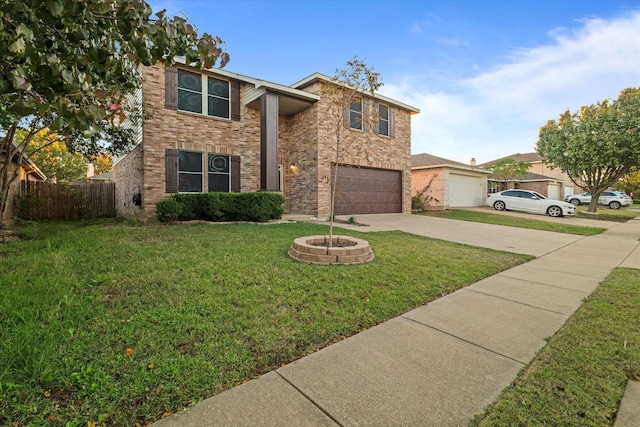 view of front facade featuring a garage and a front yard