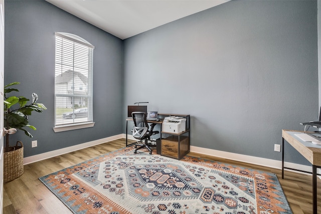 office area featuring hardwood / wood-style floors and a healthy amount of sunlight