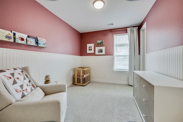 living area with light carpet