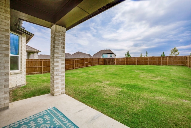 view of yard with a patio area