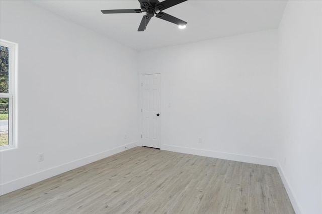 spare room with ceiling fan and light hardwood / wood-style floors